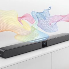 A sleek soundbar emitting colorful sound waves in a modern living room with minimalist decor and smart home devices.